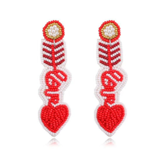 Fish bone heart earrings in red