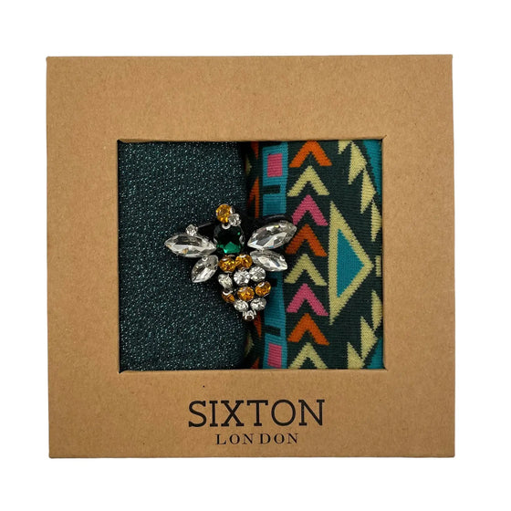 Sock box with a sparkling pin