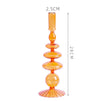 Tall candle holder in orange glass