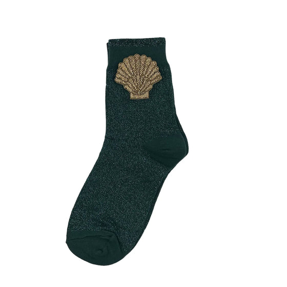 Tokyo socks in teal with a shell brooch